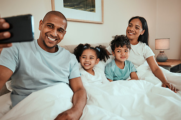 Image showing Family, selfie and phone in bedroom for social media, profile picture or relax with mom and dad in the morning, waking up and bed. Parents, kids and smile on face in memory, together or quality time