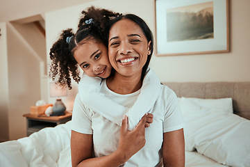 Image showing Portrait, mother and girl with on a bed, hug and happiness with quality time, love and weekend. Family, mama or female child with joy, home or fun in a bedroom, face and embrace with a smile or relax