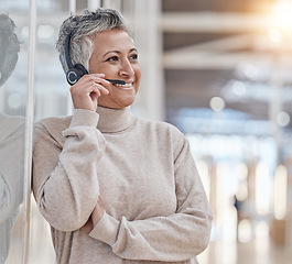 Image showing Call center, mature woman and microphone for communication, customer service or thinking of telecom questions. Telemarketing agent consulting for CRM support, sales and solution for FAQ advisory help