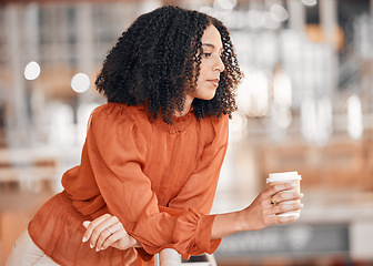 Image showing Business woman, thinking and coffee at work with focus, mindset and concentration at office. Profile of an african female entrepreneur with cup to dream of opportunity, ideas and vision for career