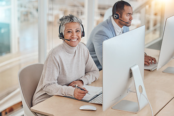 Image showing Computer, portrait and an elderly woman in a call center for customer service, support or assistance online. Contact, smile and happy senior consultant working at a desk in a professional crm office