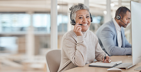 Image showing Computer, portrait and a senior woman in a call center for customer service, support or assistance online. Contact, smile and happy female consultant working at a desk in her professional crm office