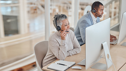 Image showing Computer, consulting and a senior woman in a call center for customer service, support or assistance online. Contact, headset and elderly consultant working at a desk in her professional crm office