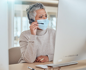 Image showing Call center, face mask and consulting with business woman in office for communication, customer service or advice. Healthcare, virus and bacteria with employee for contact, help desk or hygiene