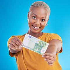 Image showing Money, note and happy woman in portrait for success, cash offer and investment choice on blue background. Face, financial profit and african person or winner with bonus, cashback or payment in studio