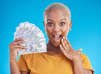 Image showing Money, wow and black woman in portrait for success, student loan or lottery fan on blue background. Surprise face, bonus and young person, student or winner for cashback or financial growth in studio