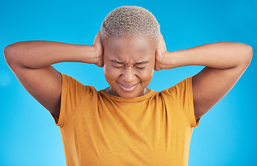 Image showing Stress, headache or black woman cover ears in studio on blue background with noise crisis or anxiety. Conflict, scared person or African girl with fear of trauma, head pain or sound distraction