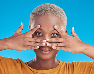 Image showing Face, hands and skincare of black woman for beauty in studio isolated on a blue background. Portrait, natural and African model with cosmetics in facial treatment for wellness, aesthetic and health