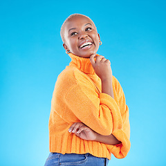 Image showing Happy, African woman and thinking of fashion in studio, blue background or natural beauty and confidence in casual style or clothes. College student, arms crossed and happiness in winter clothing