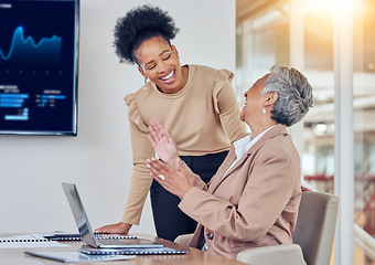 Image showing Business women, laptop and happy together for analysis, results and comic joke with finance, crypto or trading. Senior CEO, financial advisor and computer at desk for investment, coaching or laughing