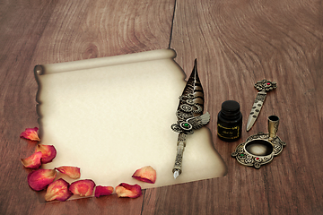 Image showing Parchment Paper Scroll with Rose Petals for Love Letter