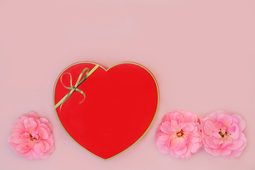 Image showing Chocolate Heart Shape Gift Box and Pink Rose Flowers