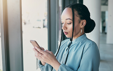 Image showing Phone, typing and business black woman in office for social media, browse internet and mobile app. Networking, professional and female worker on smartphone for website, research and communication