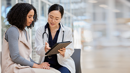 Image showing Doctor, woman patient and tablet for consulting with results, medical info and talk for healthcare with mockup space. Japanese medic, digital touchscreen or show video for surgery, wellness or advice