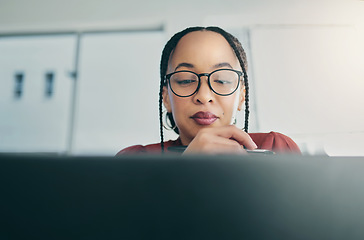 Image showing Thinking, laptop and face of professional woman reading, planning and editing online news report, social media post or research. Editor, project ideas and female reporter working on article story