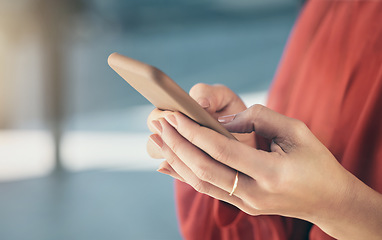 Image showing Phone, typing and hands of business person in office for social media, internet and mobile app. Technology, professional and closeup of worker on smartphone for website, communication and schedule