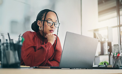 Image showing Thinking, laptop and business woman focus, planning and reading online news report, project feedback or research ideas. Wonder, problem solving and professional female designer with doubt over design