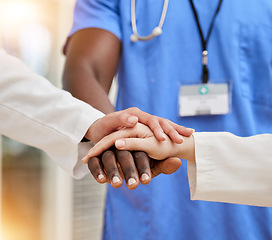 Image showing Doctors, teamwork and hands together for support, collaboration and healthcare motivation, goals and faith. Hope, diversity and stack sign of medical people with clinic, hospital or surgery goals