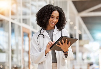 Image showing Smile, doctor and woman with tablet for research, telehealth or healthcare in hospital. Technology, happy and African medical professional on wellness web app, online consultation and reading email