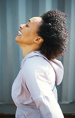 Image showing Breathe, fitness and happy black woman in city for exercise, training and workout in morning. Sports, freedom and face of person relax after running for healthy body, wellness and fresh air outdoors