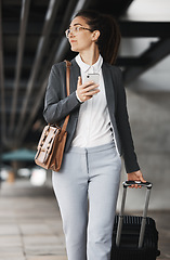 Image showing Phone, vision and suitcase with a business woman walking in an airport parking lot outdoor in the city. Mobile, luggage and thinking with a young female professional on an international work trip