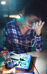 Image showing Woman, technician and pc motherboard with electronics, circuit and tired with holographic overlay in lab. Information technology, maintenance and engineer with fatigue, hardware and system in night