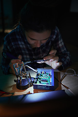 Image showing Woman, computer motherboard and night with soldering iron, manufacturing and microchip for it development. Information technology, circuit board and electronics for engineering, hardware and system