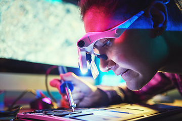 Image showing Woman, motherboard and engineering with soldering iron for manufacturing, microchip and night. Information technology, circuit board and electronics for programming, hardware and system with tools