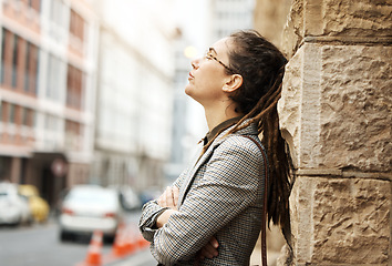 Image showing Stress, fatigue and a tired corporate woman in the city, taking a break for mental health. Bankruptcy, depression or anxiety with an overworked female employee in town during a financial crisis