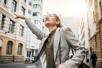 Image showing Woman in city, travel and stop taxi, commute to work with buildings, professional and transportation outdoor. Corporate female person in urban street, business clothes and journey to workplace