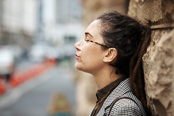 Image showing Mental health, exhausted and a business woman in the city, taking a break during a financial crisis. Face, stress and anxiety with a tired young female employee outdoor after a mistake or job loss