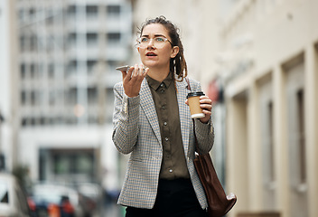 Image showing Speaker phone call, city and professional woman walking, speaking and planning in discussion, conversation or communication. Voice note, coffee break and outdoor person chat on morning consultation