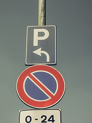 Image showing Vintage looking No parking sign over blue sky