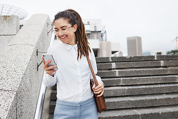 Image showing Phone, walking and happy woman texting in a city for travel, chatting or commute outdoor. Smile, social media and female chatting, reading or checking email, app or online communication on town walk