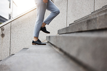 Image showing Walking, shoes and business woman on steps for morning commute, journey and travel. Professional goals, city and closeup of female person for career, work and job progress in urban town by building