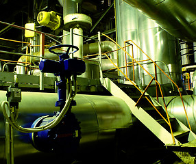 Image showing Pipes, tubes, machinery and steam turbine at a power plant