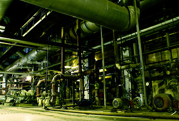 Image showing Pipes, tubes, machinery and steam turbine at a power plant