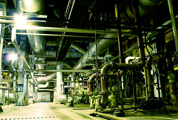 Image showing Pipes, tubes, machinery and steam turbine at a power plant