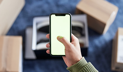 Image showing Cellphone green screen, delivery or person hands online shopping, typing ecommerce search or check distribution mockup. Courier service, product promo or home customer with cellphone, shipping or box