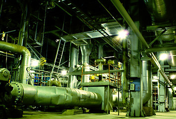 Image showing Pipes, tubes, machinery and steam turbine at a power plant