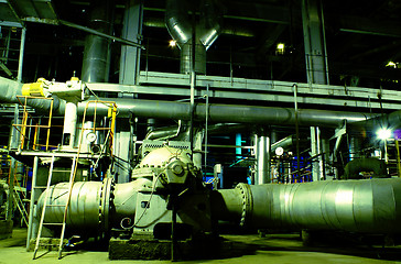 Image showing Pipes, tubes, machinery and steam turbine at a power plant
