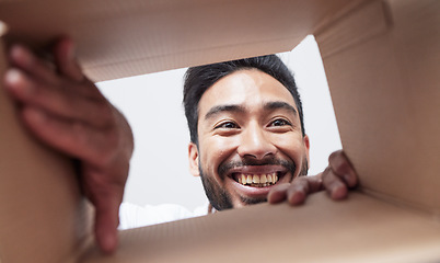 Image showing Open, delivery or happy man with box, gift or package with smile for courier service or ecommerce. Face, wow or customer excited by mail post order, parcel cargo or online shopping shipping present