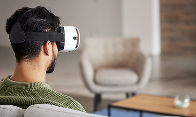 Image showing Man, sofa and virtual reality glasses for interior design software, metaverse and user experience online. Person back on couch or living room for home VR, high technology and futuristic vision