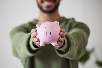 Image showing Finance, investment or hands of man with piggy bank for financial wealth growth or savings increase. Closeup, income or person holding profit earnings budget in tin for safety or insurance security