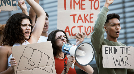 Image showing Fight, protest and woman with a megaphone in a city for announcement, change or community power. Speaker, transformation and people with fist for justice vote, freedom or government attention speech
