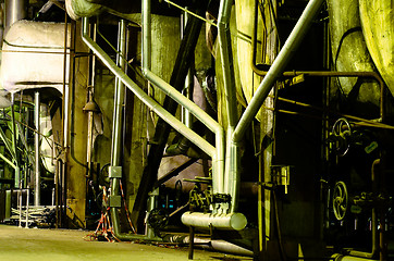 Image showing Pipes, tubes, machinery and steam turbine at a power plant