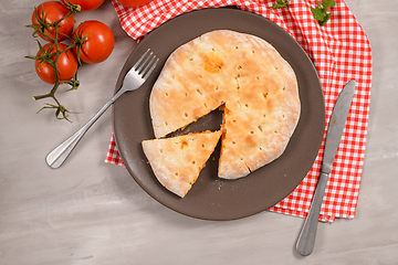 Image showing Pizza calzone on wooden background