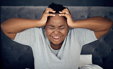 Image showing Insomnia, screaming and tired black woman in bedroom at night with anxiety, headache and stress at home. Depression, mental health and female person with pain for problem, anger and morning fatigue