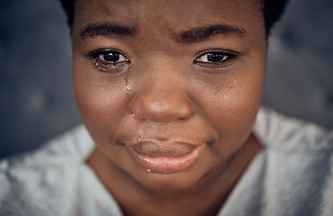 Image showing Sad, crying and black woman with depression, anxiety and financial crisis. Tears, stress and African person in pain from breakup, trauma and disaster of death, mental health problem and frustrated