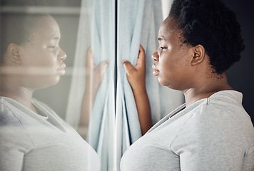 Image showing Window, thinking or black woman with depression, stress or mental health crisis by curtain at home. Worry, lonely lady or sad African person with broken heart, loss or anxiety from emotional grief